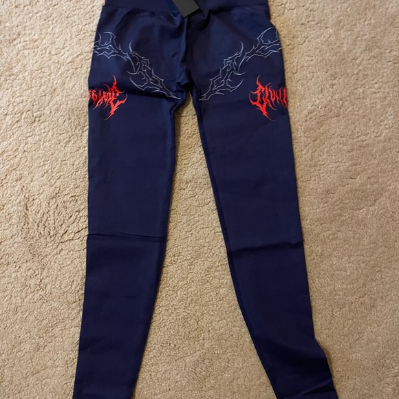 Navy Blue Leggings with Red and White Design - Picture 1 of 1